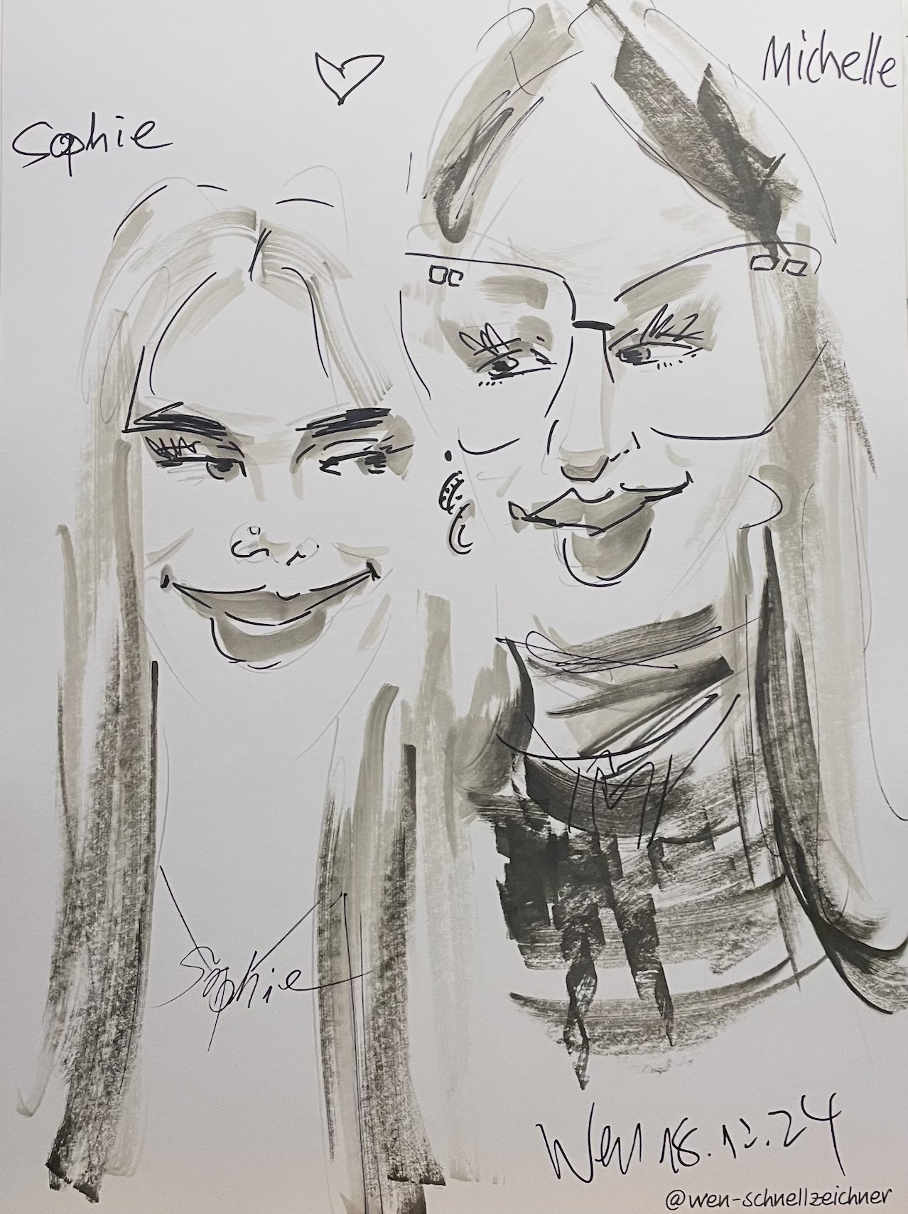 Event guests with a finished live caricature
