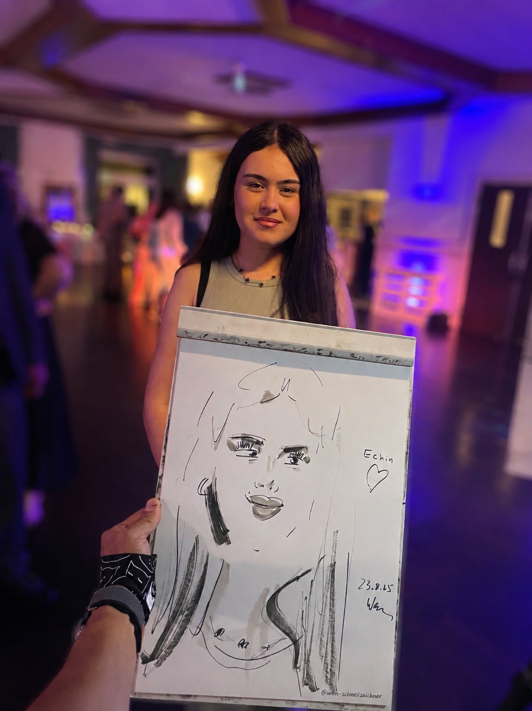 Woman with her live-drawn caricature